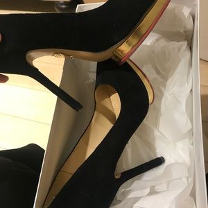 Charlotte Olympia pump with heart sole